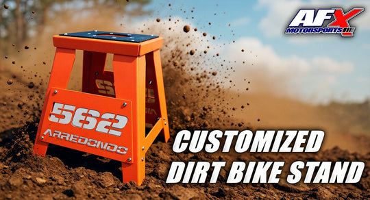 Orange dirt bike stand with '5662' branding on a dirt track background, featuring AFX Motorsports logo.