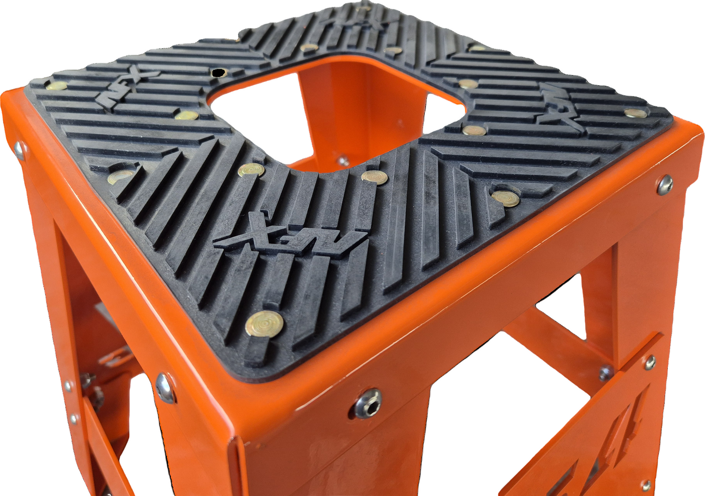 Orange and black step stool with textured surface on a white background